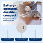 PetSafe pet barrier wireless transmitter placed outdoors near garden flower beds