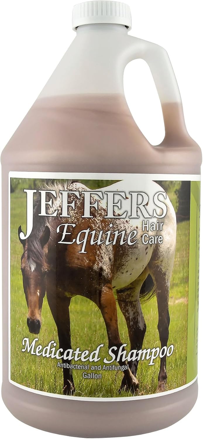 Jeffers Equine shampoo bottle held to show scale for equine grooming kit