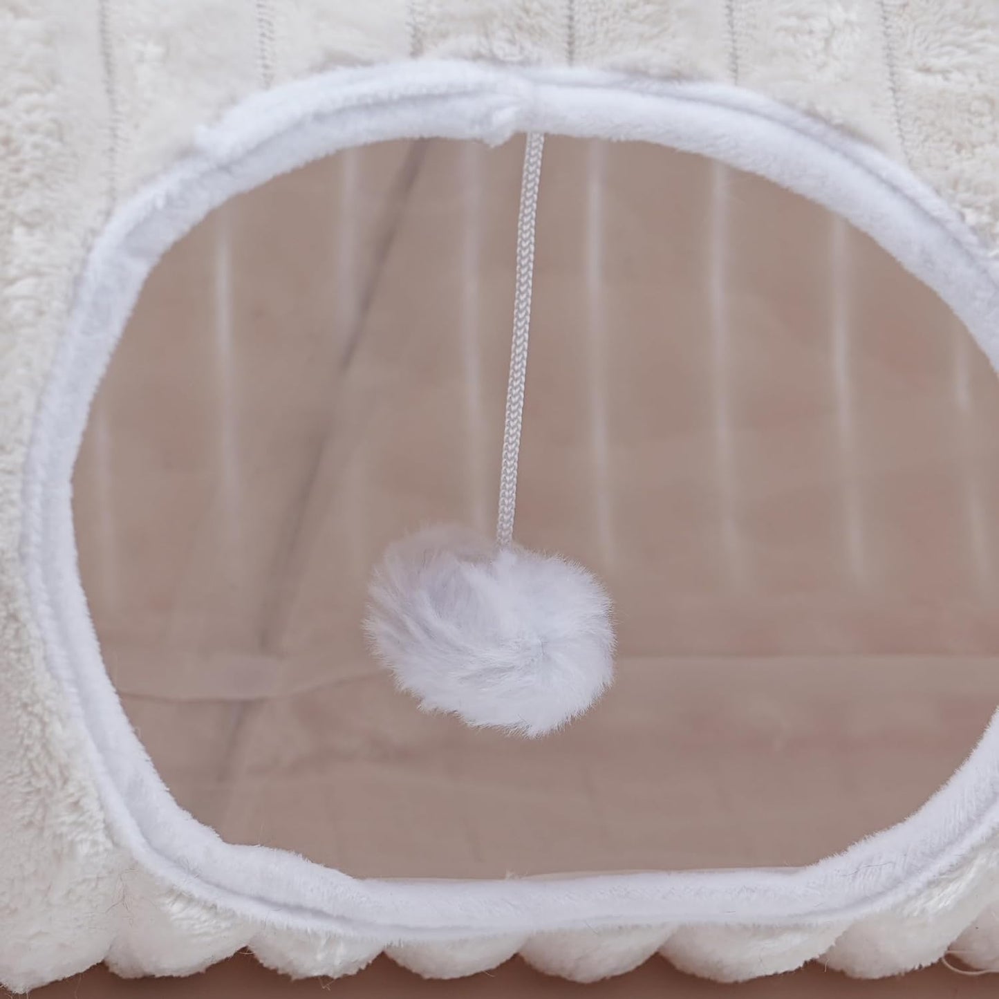 Space saving collapsible cat toy folded flat for easy storage and travel convenience.