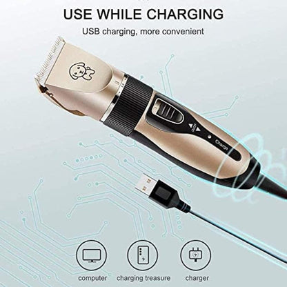 Yasao gold pet hair trimmer being charged via power cable