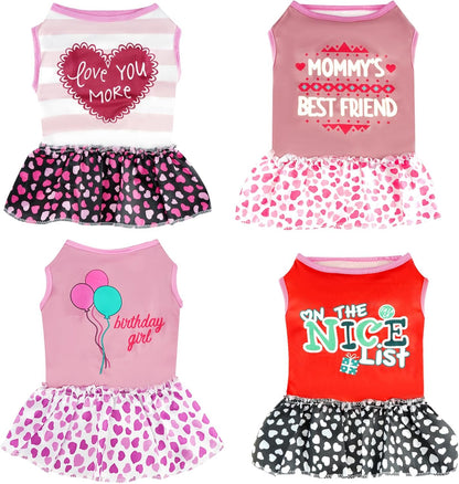 Pistha four pack dog dresses front view of adorable girl puppy holiday apparel.
