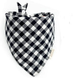 Authentic USA imported cotton pet neck wear on a small puppy.