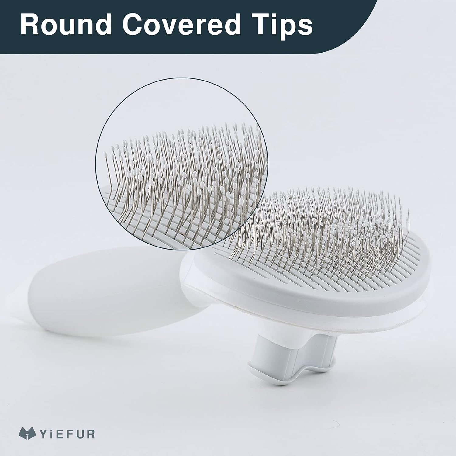 YiEFUR grooming comb showing the self cleaning button being pressed