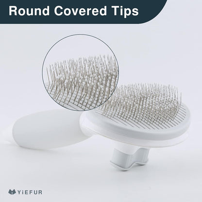 YiEFUR grooming comb showing the self cleaning button being pressed