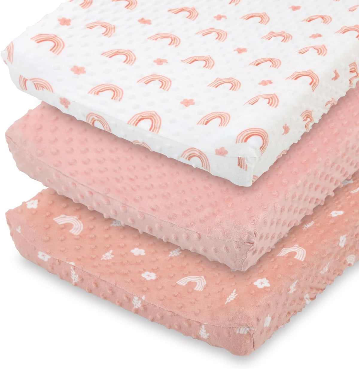 The Peanutshell baby changing pad cover front view in pink minky boho rainbow design