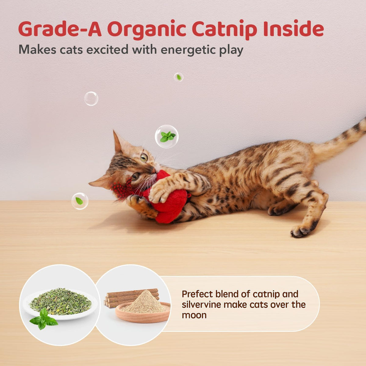 Cat batting at Potaroma bird kicker toy