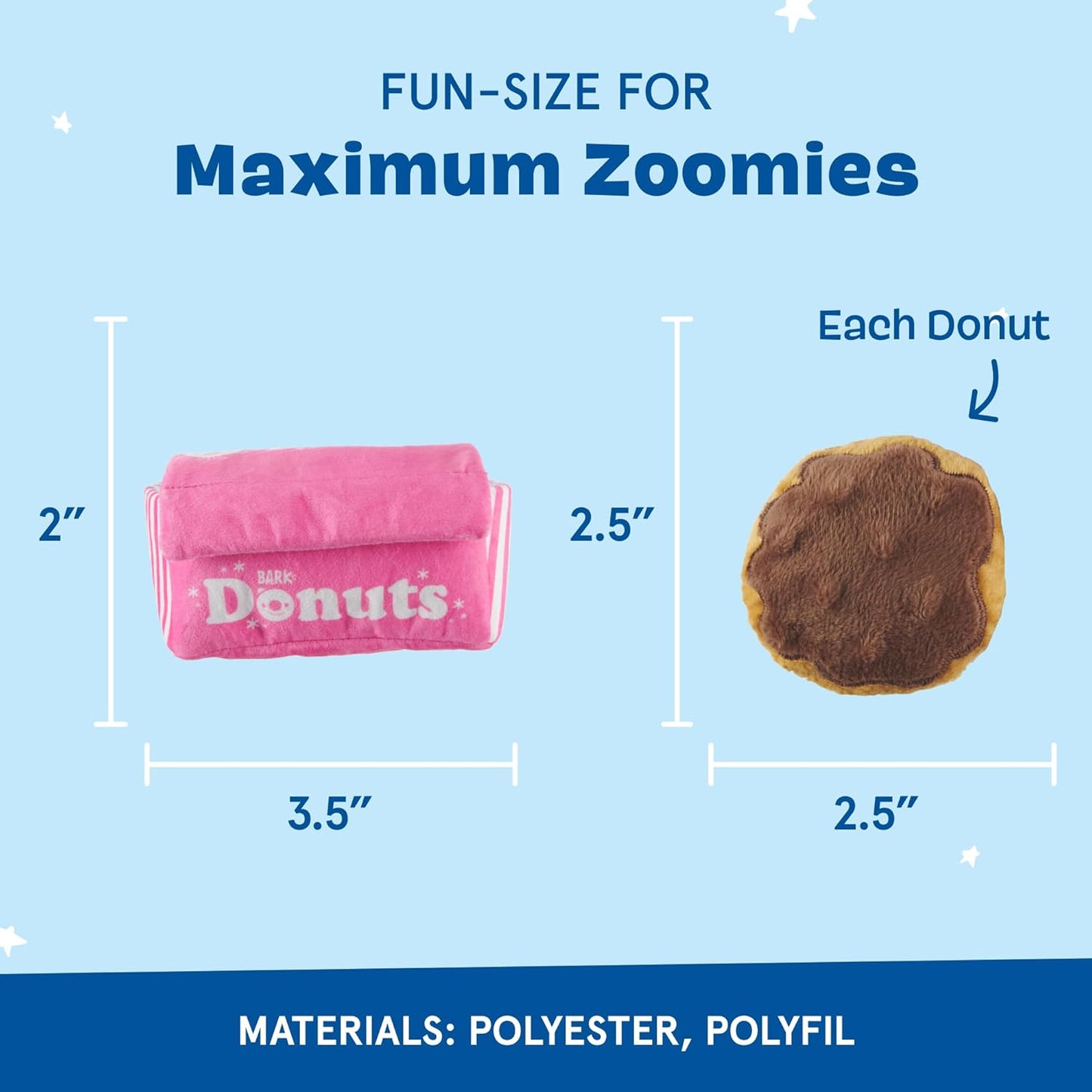 Small dog playing with Barkbox crinkle donut box