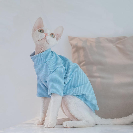 Side profile of Sphynx cat wearing blue pinstripe thermal fleece shirt