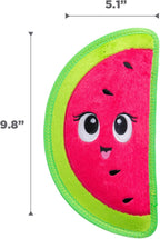 Outward Hound Tough Skinz watermelon toy held in hand for scale
