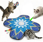 OPDEKEHA interactive cat toy electronic play mat front view showing blue floral fabric cover.