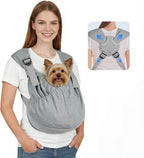 Owner wearing black dog sling carrier for small pets