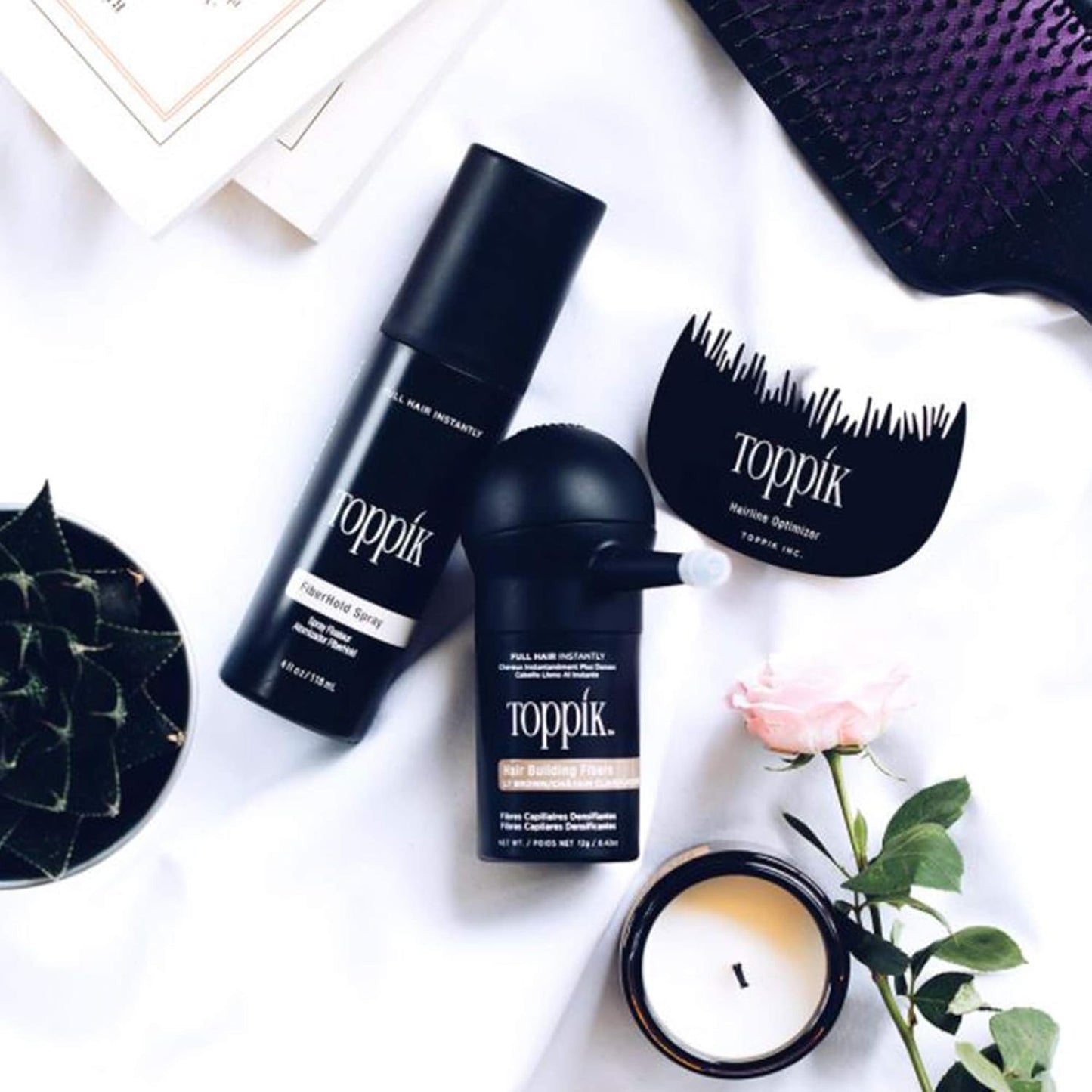Imported Toppik clear locking mist for weather resistant and sweat resistant hair volume.