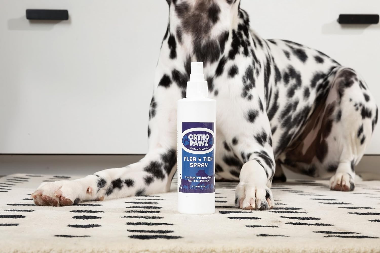 Ortho Pawz citrus oil flea spray for dogs and cats highlighting natural ingredients.