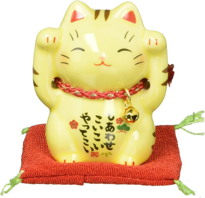 Yakushigama matte black ceramic Maneki Neko miniature fortune figurine highlighting artisanal details.