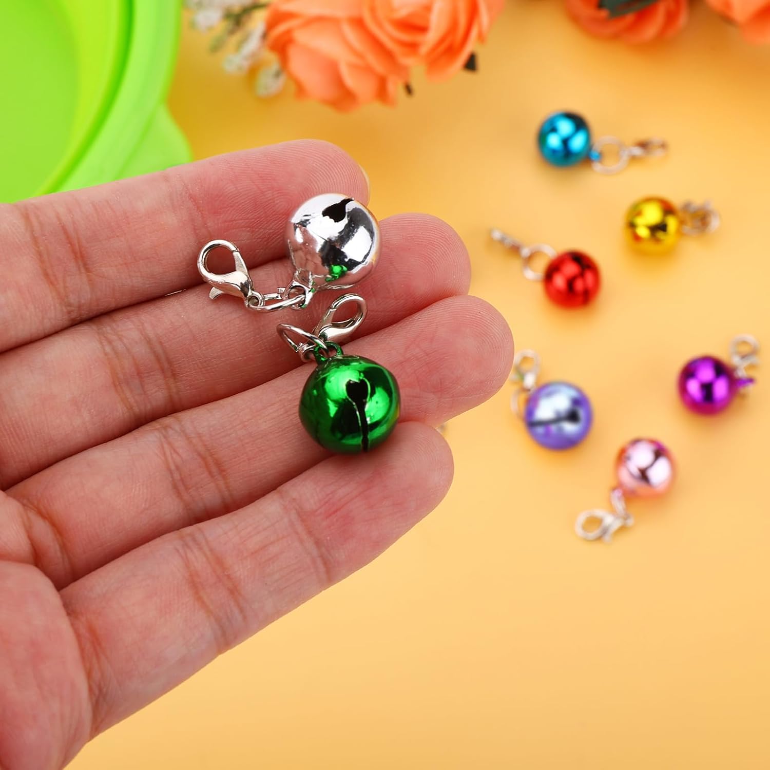 Assorted small festive craft jingle bells with clasps