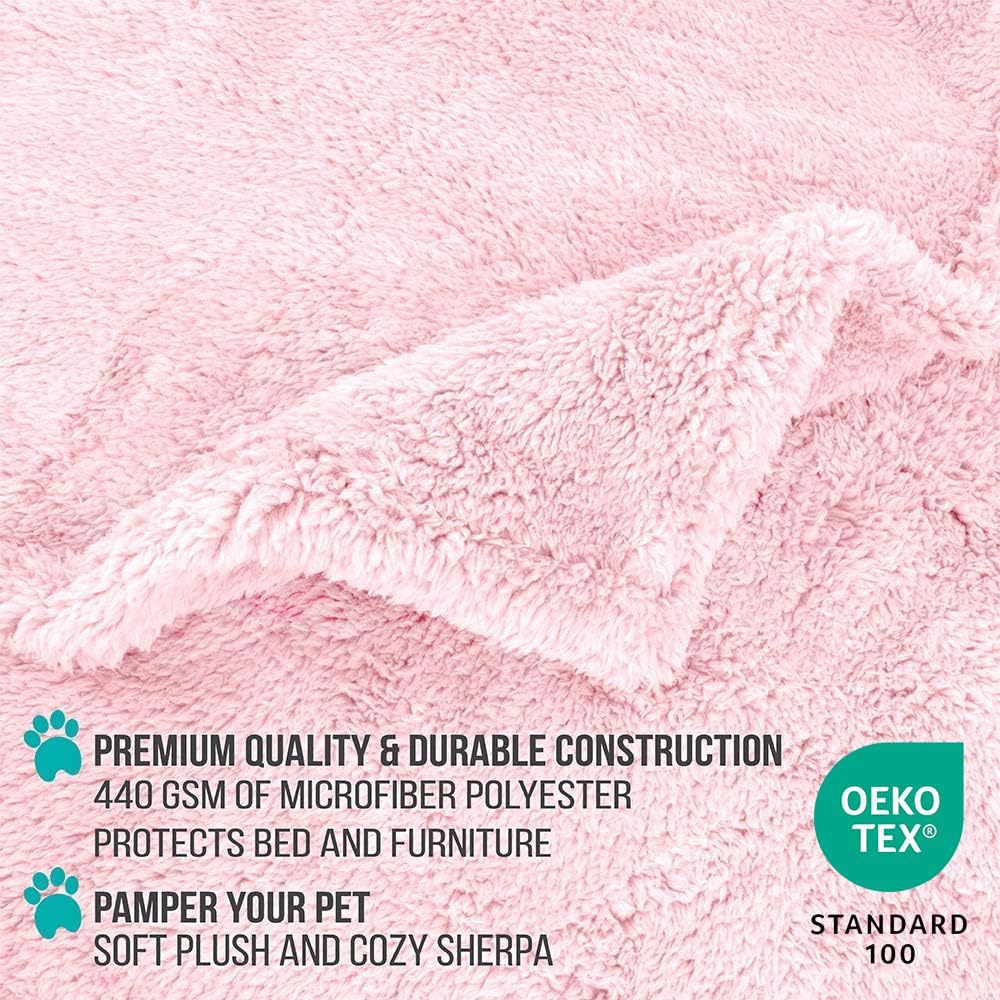Washable cat blanket folded neatly displaying the pink blush color