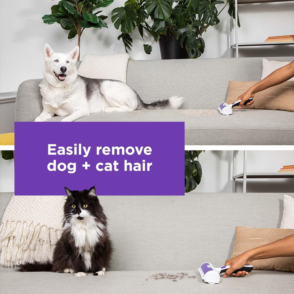 Hand using Black+Decker roller on a sofa for dog hair removal