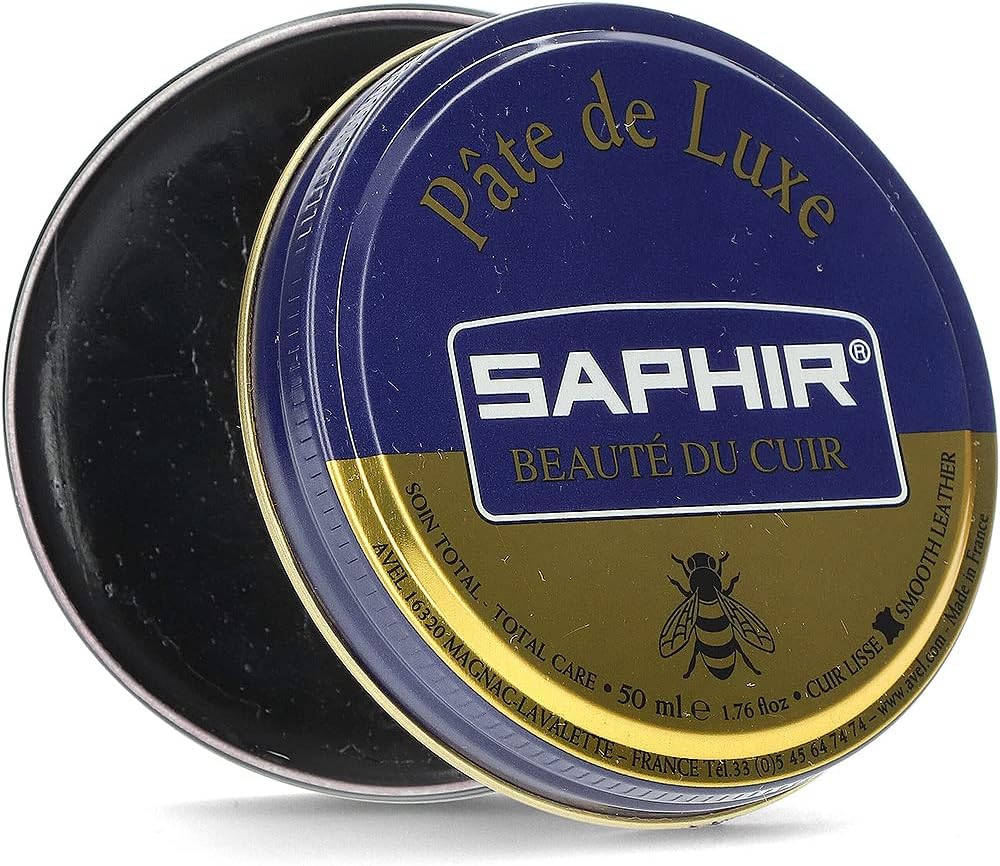 Saphir premium leather wax paste tin opened showing smooth black shoe polish formula