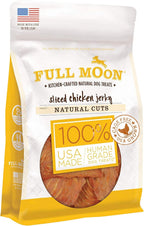 Small dog enjoying Full Moon chicken strip treat