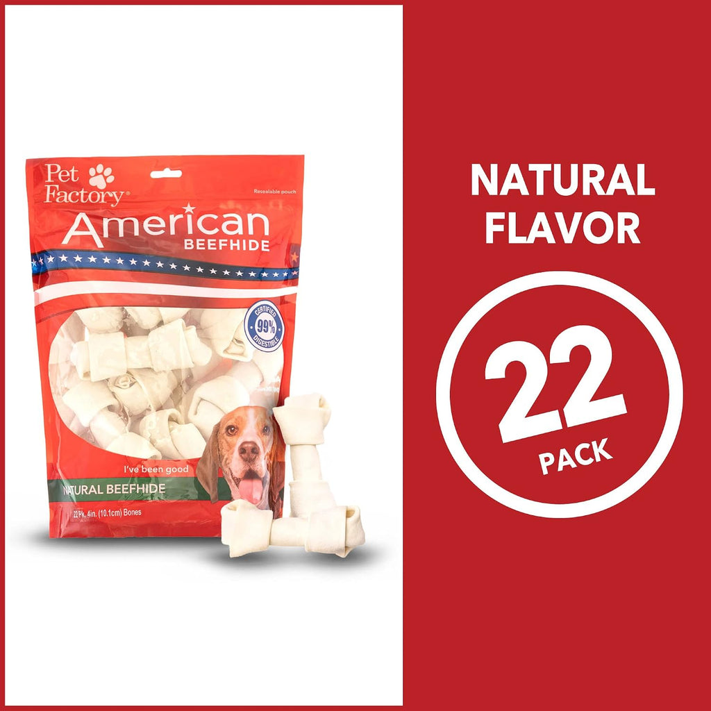 Small dog enjoying Pet Factory knotted beefhide chew treat