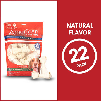Small dog enjoying Pet Factory knotted beefhide chew treat