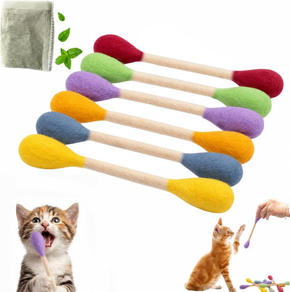 Size reference of giant cotton swab cat toy in hand