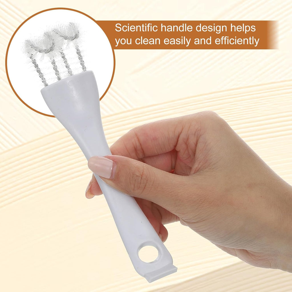 Long handled cage cleaner brush scrubbing tight wire corners and perches in a bird enclosure