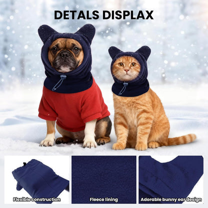 Side profile of dog wearing blue winter pet hood