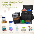Goloni black pet weekend travel set attached to a luggage handle