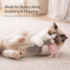Close up of rabbit fur and feather detail on cat toy