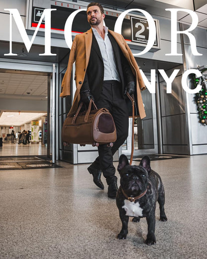 Moor Nyc luxury travel bag with storage pockets visible