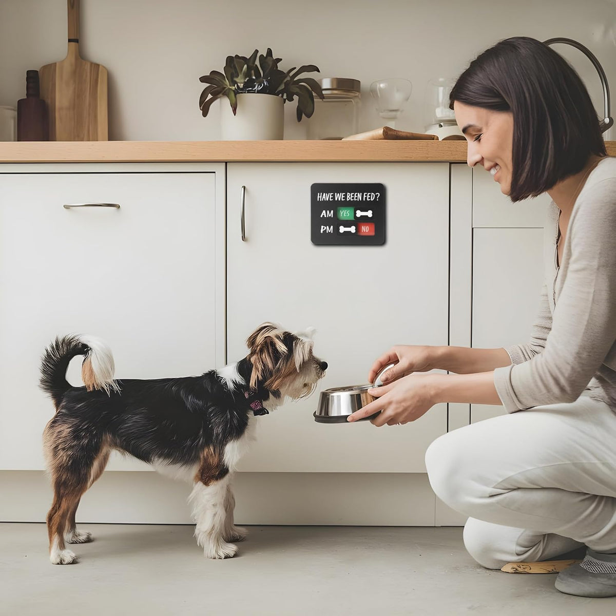 EliteSign black dog feeding tracker showing the durable magnetic backing