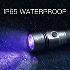 Tactical UV detector highlighting authentic security threads on paper currency notes in a darkened setting
