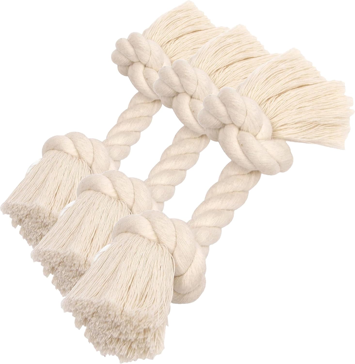 Close up view of the durable knotted ends of the white cotton dog toy