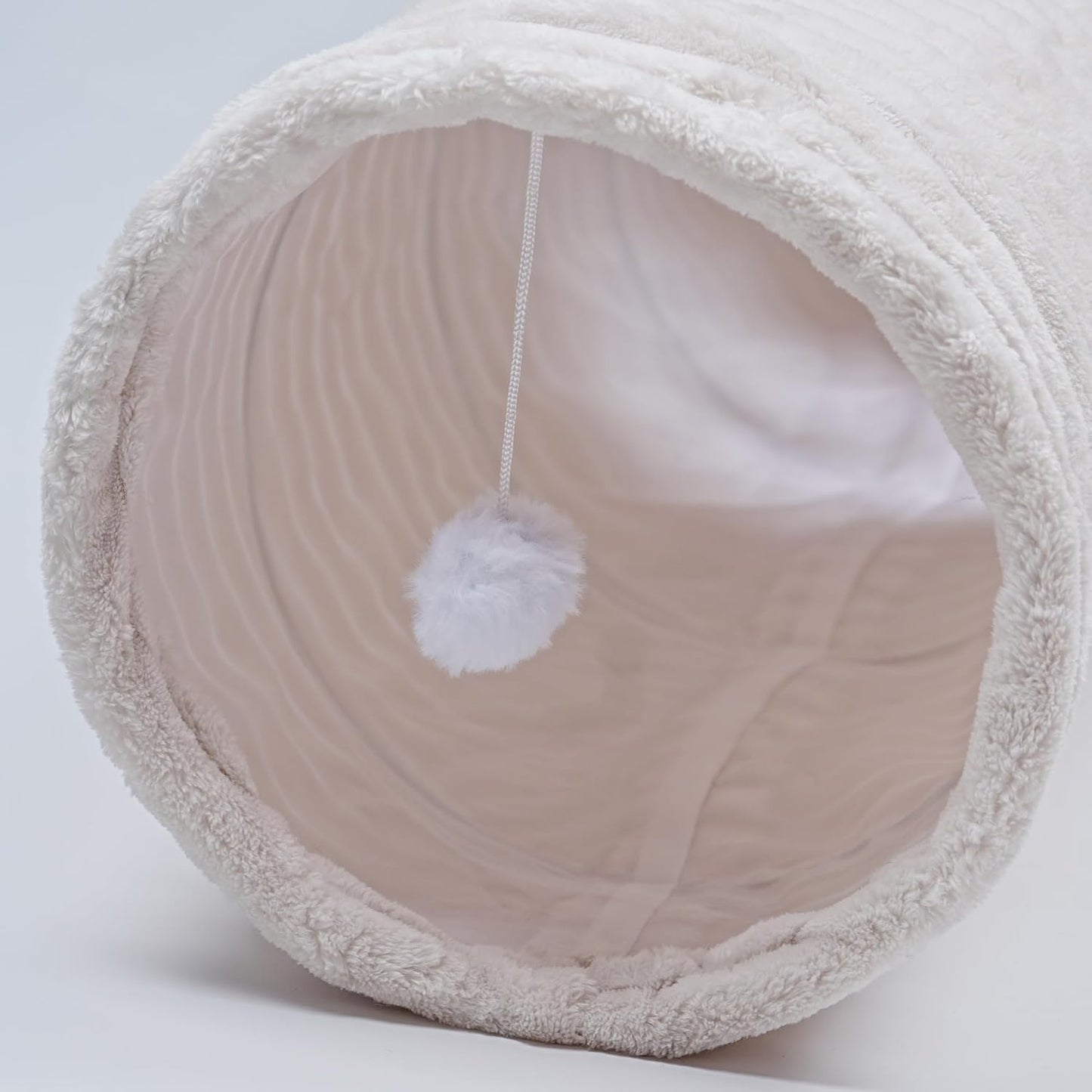 Straight tube cat bed showing the cozy flannel texture and sturdy spring framework.