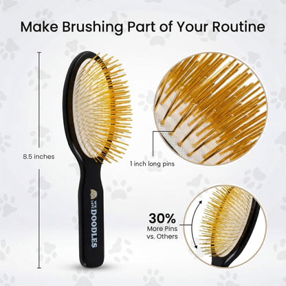 We Love Doodles dog shedding brush being held to showcase the comfortable grip.
