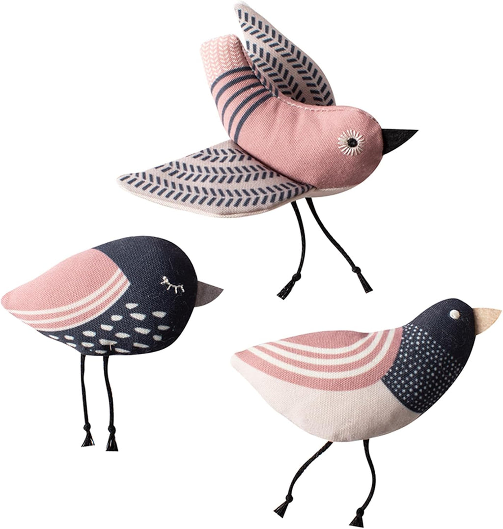 Modern home decor friendly neutral colored fish plush toys for cats by Fringe Studio.