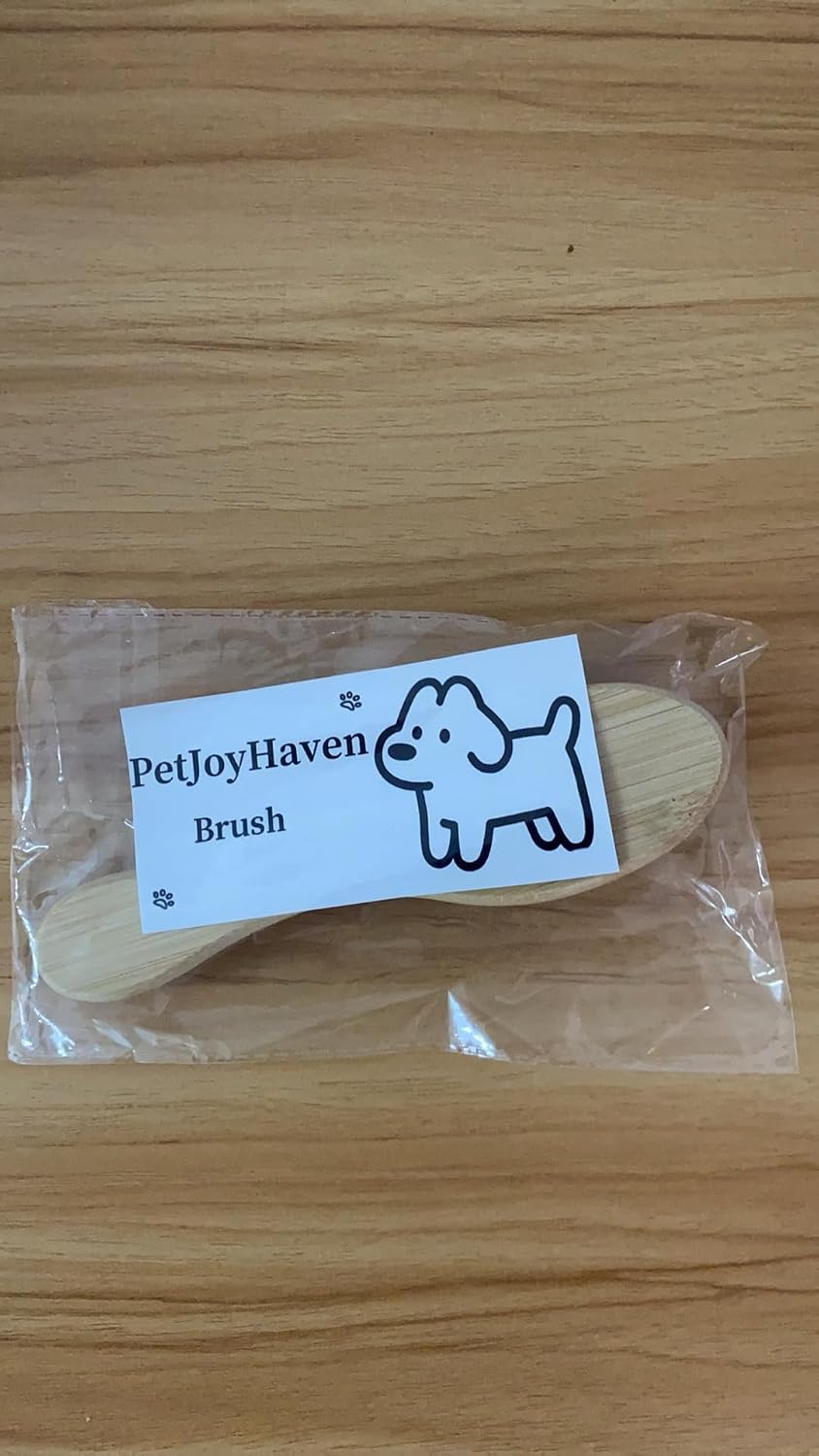 PetJoyHaven premium dog brush for short haired breeds displaying size details
