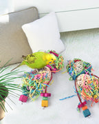 Colorful shreddable paper layers on Bissap parrot toy