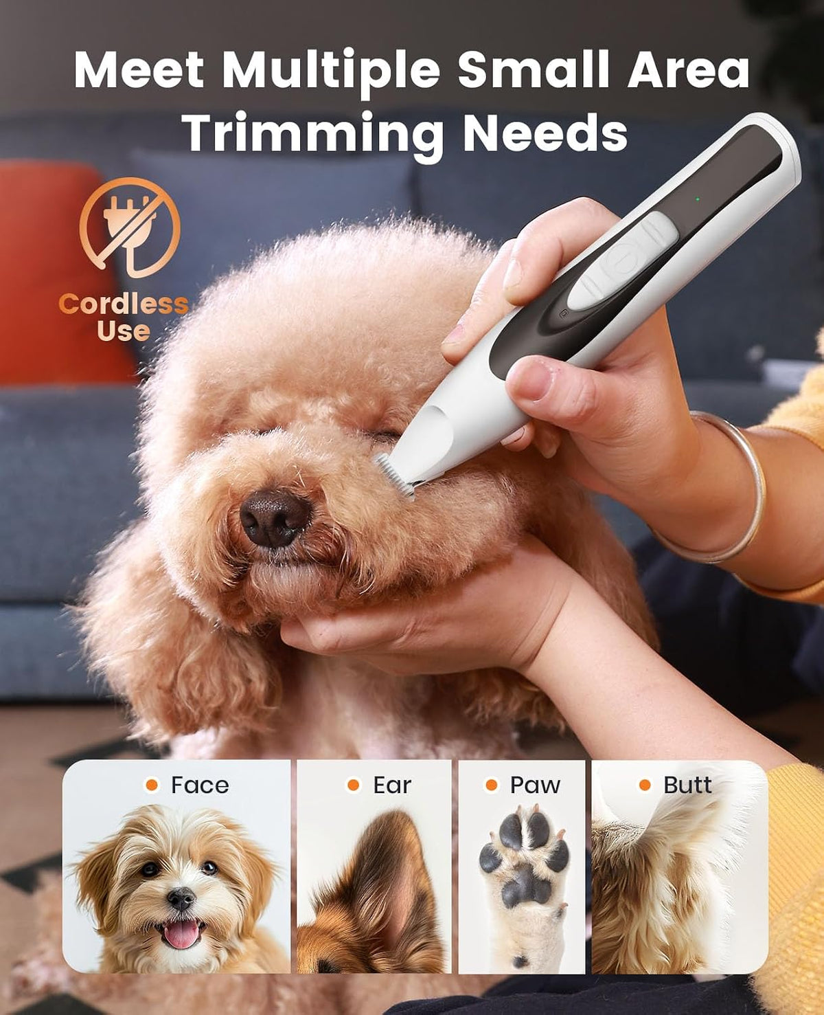 White ergonomic pet hair clipper being used on small cat paws