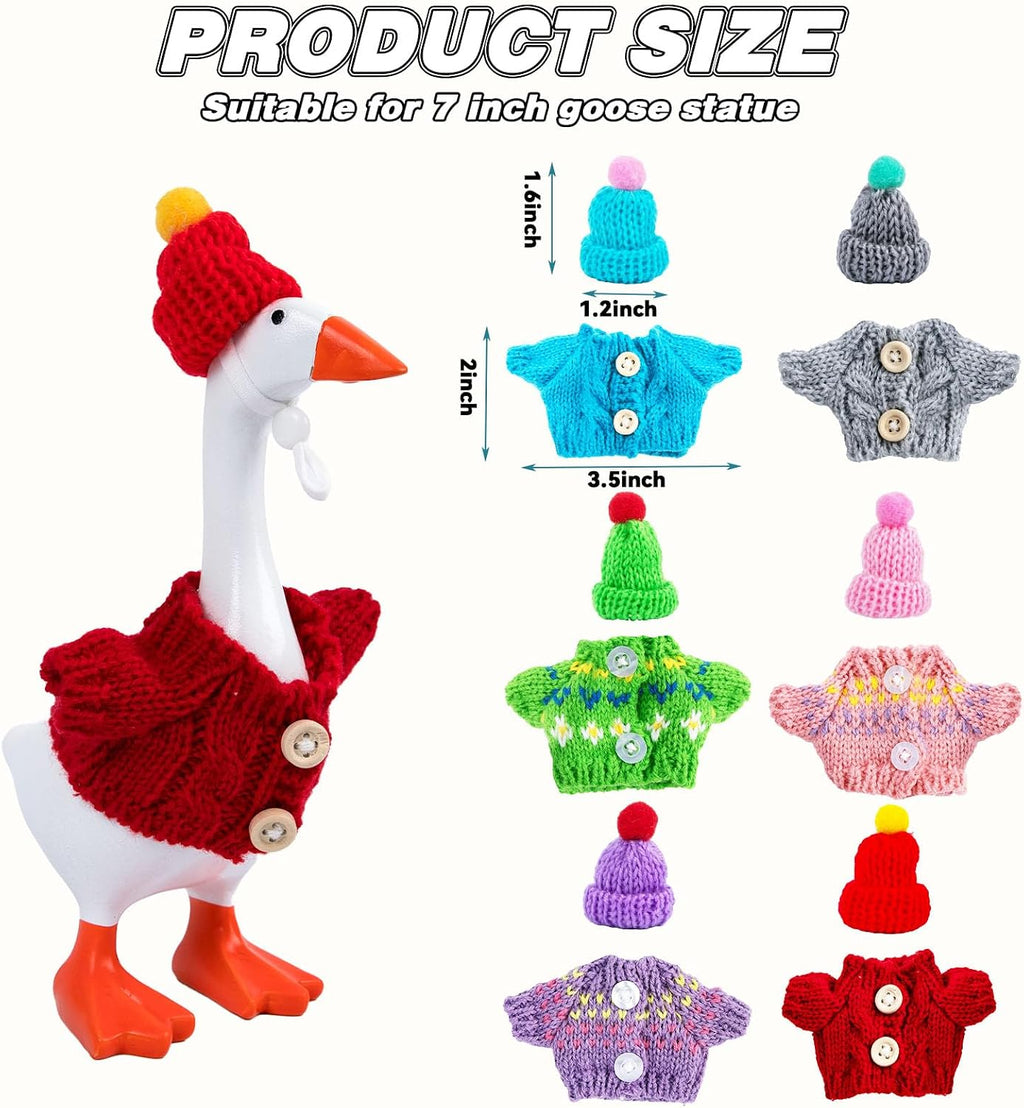 Close up of mini winter goose clothes in red and green holiday patterns for desktop figurines