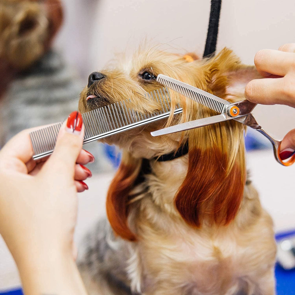Self cleaning shedding blade tool for indoor cats and dogs removing loose undercoat fur.