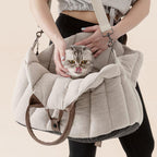 Lifestyle shot of small dog inside Peppy Buddies travel purse