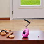 Portable pet behavior aid clicker with durable metal attachment clasp