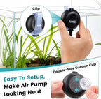 Hygger mini air pump placed next to a small 5 gallon glass fish tank.