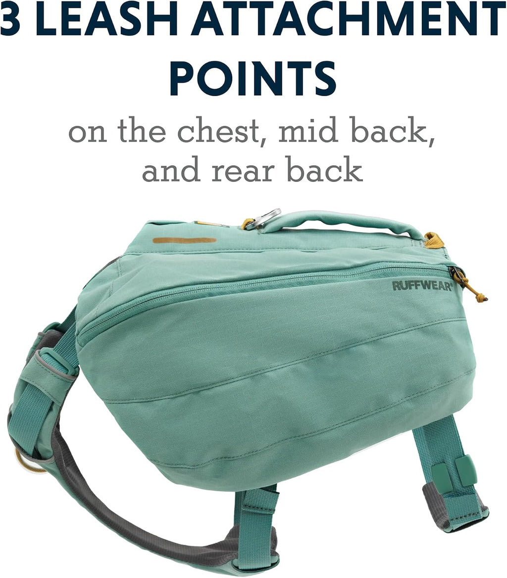 Internal stretch mesh pockets inside the green saddlebag compartment showing gear organization.