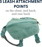 Internal stretch mesh pockets inside the green saddlebag compartment showing gear organization.
