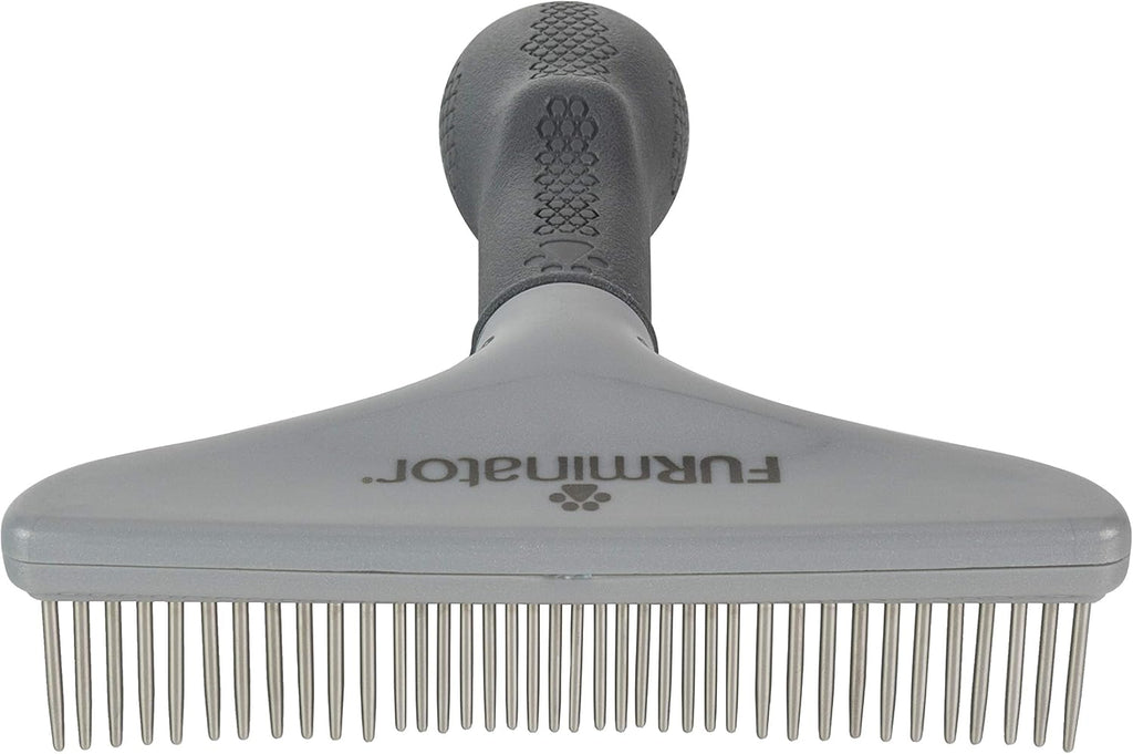 Close up of rotating metal teeth on FURminator rake