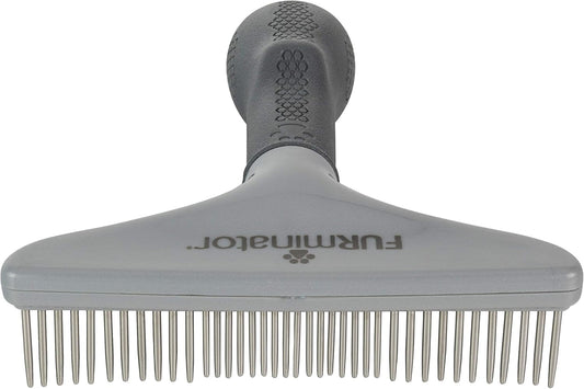 Close up of rotating metal teeth on FURminator rake
