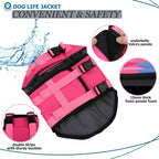 Bright wave pattern shark fin dog life preserver on the beach